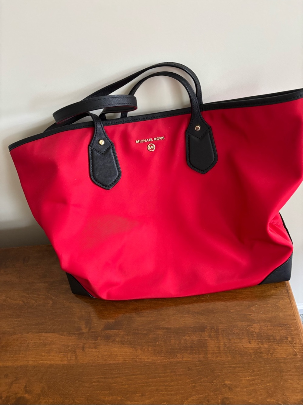 Michael Kors Red Tote with Black Trim and Handles